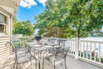 Upper level balcony with BBQ grill and outdoor dining